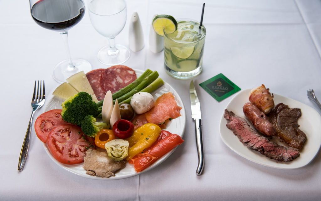 A salad bar and fresh sides wicomplement meats at Brasao Brazilian Steakhouse.