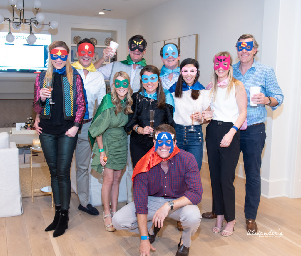 The Caroline and Andrew Bean watch party participants don their superhero masks for the Children's Museum Houston virtual gala.