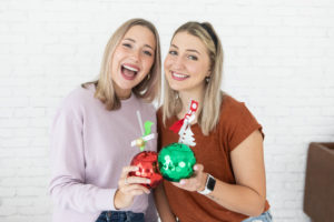 Enjoy a favorite holiday drink with Pep & Party Co.’s mini red or green disco-ball cup