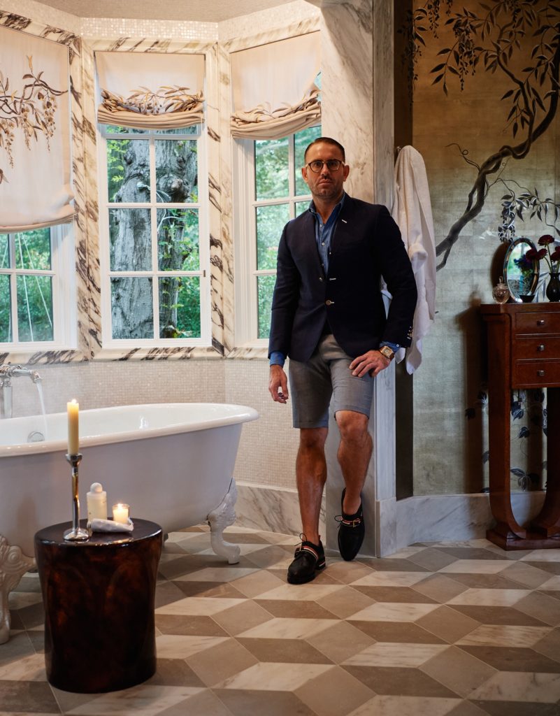 Doniphan Moore in the master bath he designed (Photo by Jonathan Zizzo)