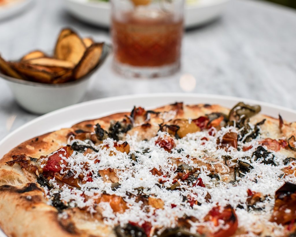 The Sporting Club serves its full menu until 11 pm and specialty pizzas until 2 am. (Photo by Corine Michel )