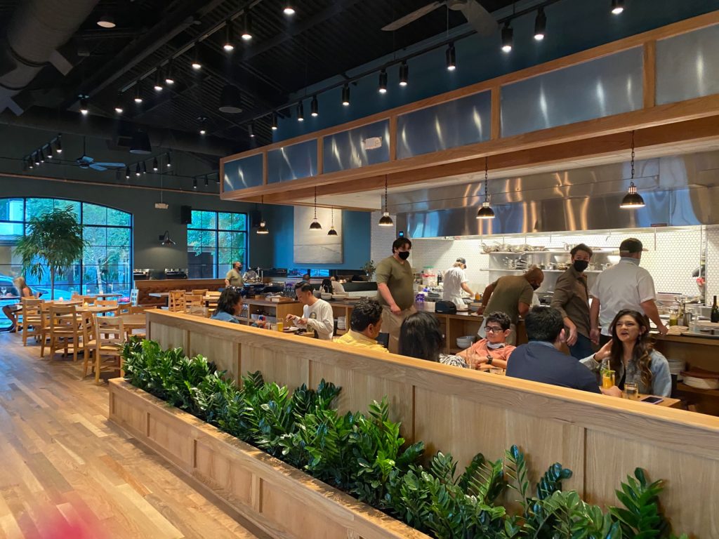 Diners at Ostia have a ringside seat to the kitchen. (Photo by Shelby Hodge)