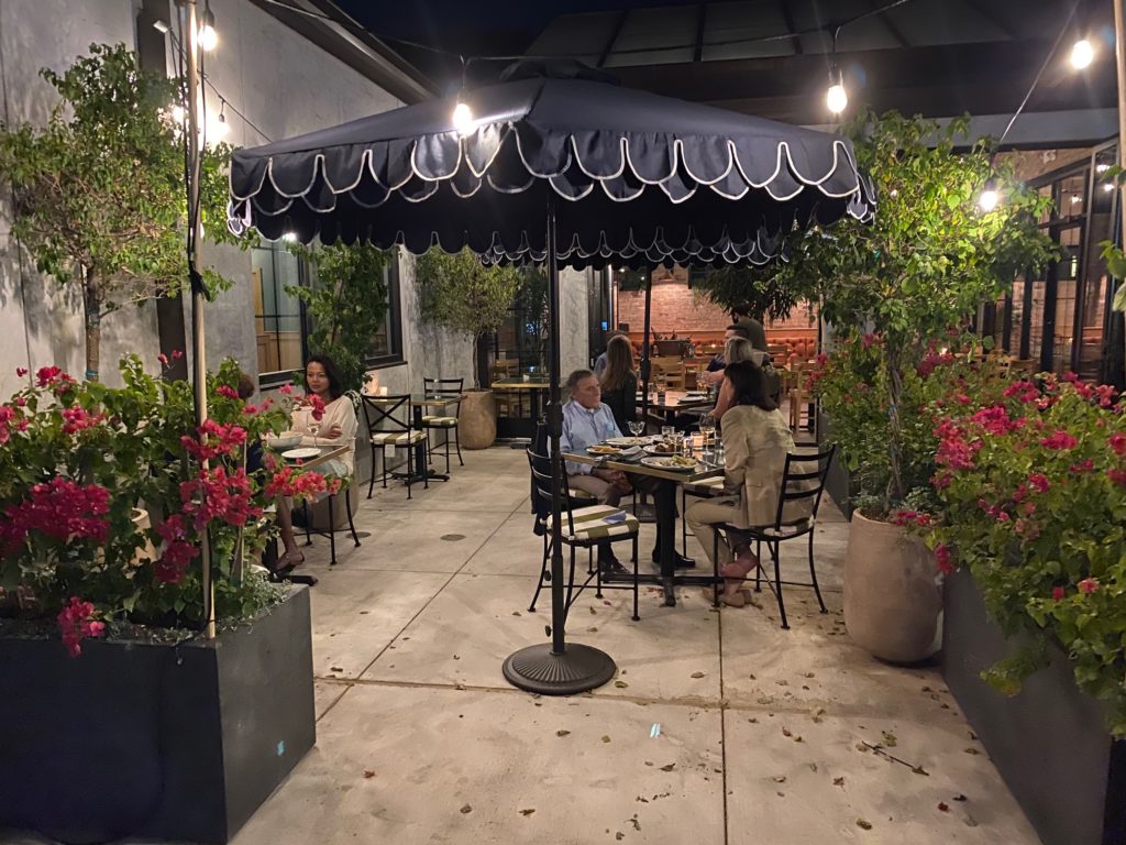 One of two patios at Ostia, this one flanked by pots of bougainvillea. (Photo by Shelby Hodge)