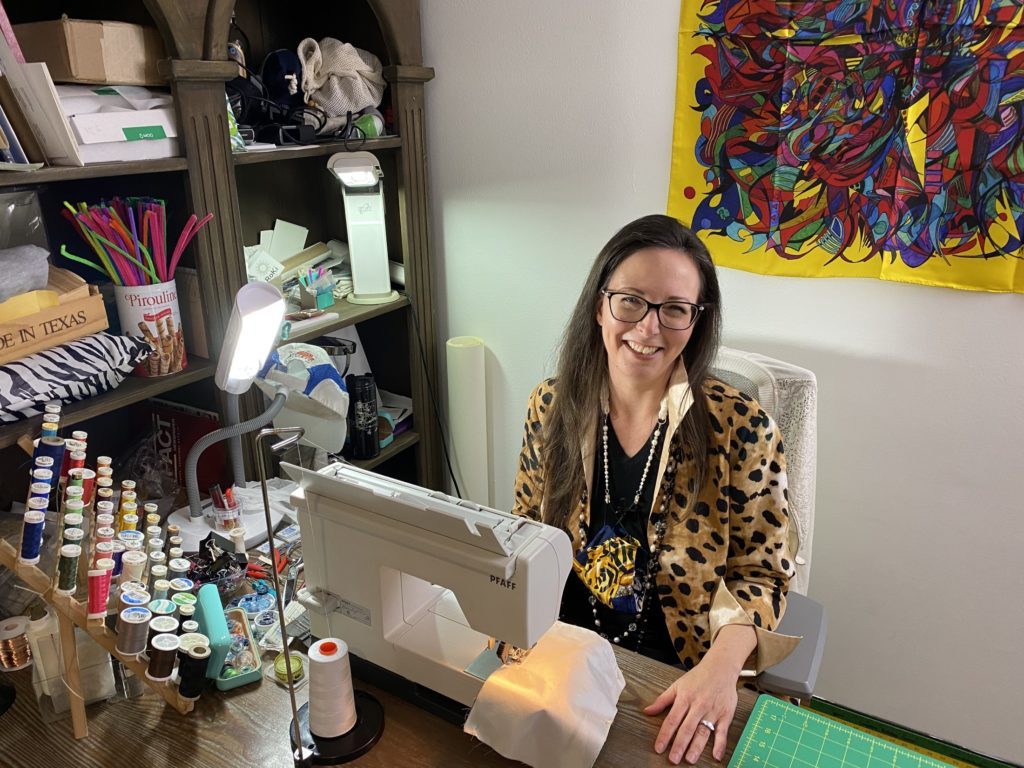 Kimberly Phipps-Nichol sews the RoKi Design masks made from up-purposed designer scarves including Hermès and Cartier.
