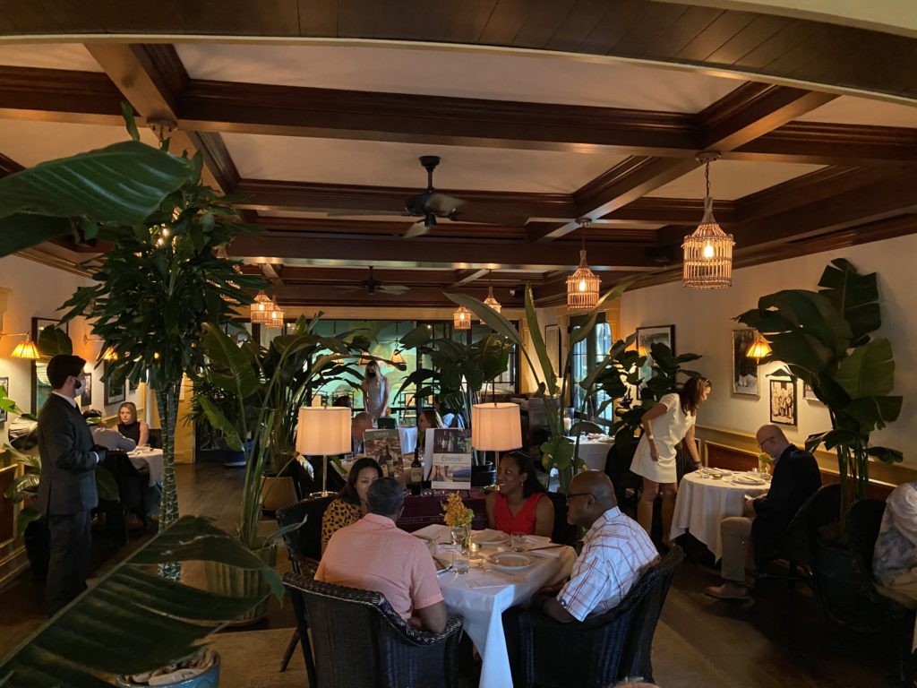 Social distancing for the Caymus wine dinner in the Le Colonial lounge was assured by the addition of banks of palm trees.