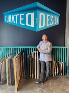 Real Estate agent David B. Atkins of Martha Turner Sotheby’s International Realty is lord of a 13,000 sq.ft. warehouse filled with furniture for staging homes for sale.