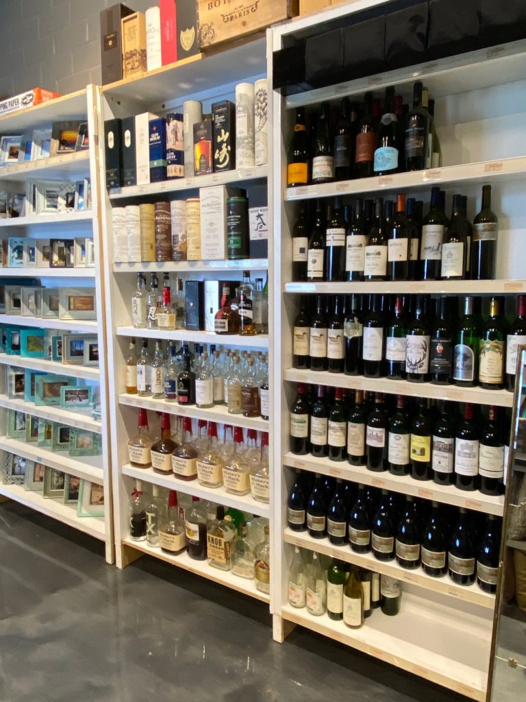 Picture frames, bar accessories and bottles are part of the home staging collection. (Photo by Shelby Hodge)