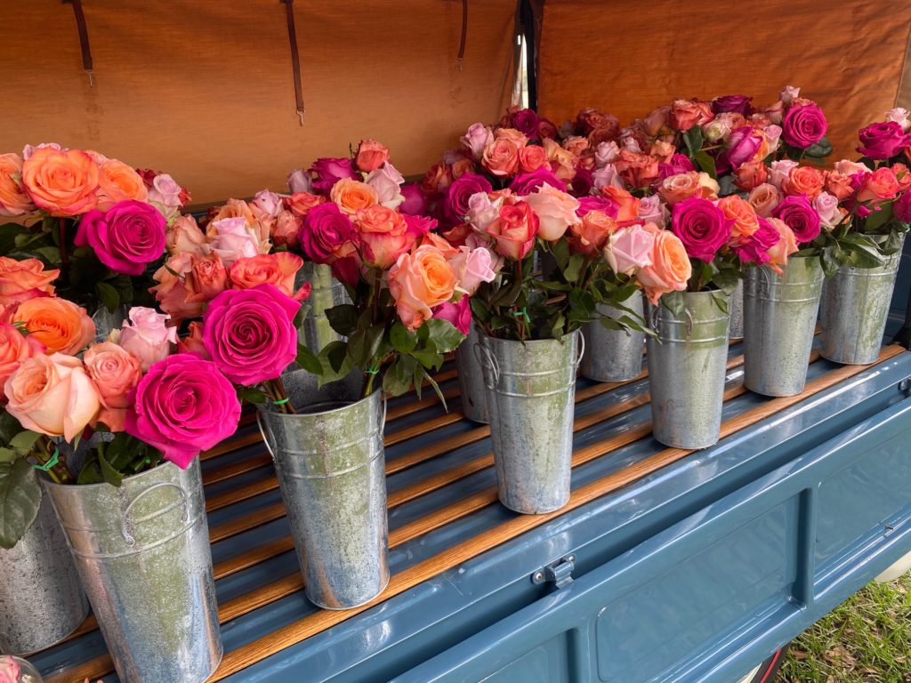 Guests at Hope Farm's Fashion in the Fields outing benefiting Recipe for Success went home with goodie bags from Tootsies and roses from Hope Farms' Flower Child truck. (Photo by Shelby Hodge)