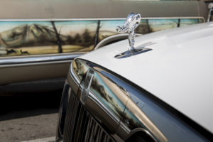 The Spirit of Ecstasy hood ornament recedes into the hood of the 2021 Rolls-Royce Ghost when the engine is turned off.  (Photo by James Lipman for Rolls-Royce)