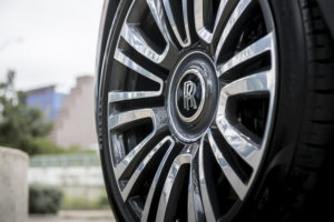 Is there any hubcap than that of the Rolls-Royce Ghost, which also features the monogram on all headrests in a buyer-selected color. (Photo by James Lipman for Rolls-Royce)
