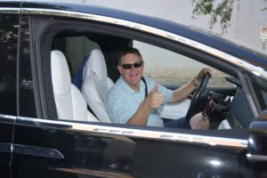 AVDA board chair Steve Winter pulls up to Minute Maid Pakr to pick his AVDA dinner packet.