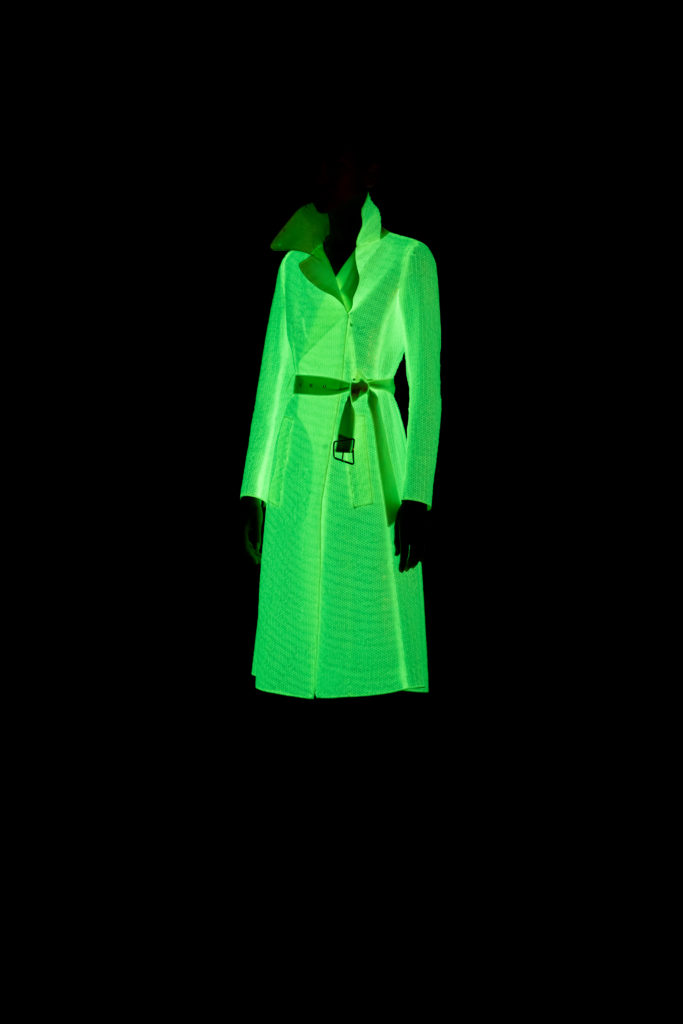 Akris phosphor fluorescent sequin double-breasted trench coat. (Photo courtesy of Akris)