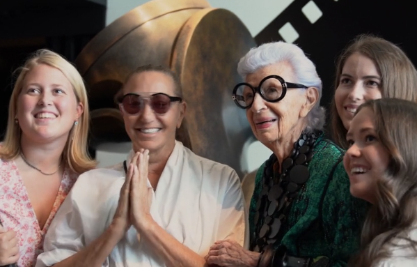 Donna Karan and Iris Apfel addressing University of Texas students in Karan's Urban Zen studio in New York City.