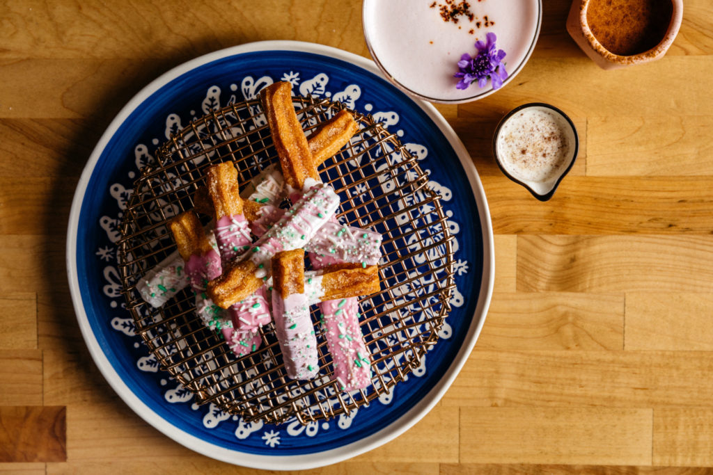 For dessert, make sure to try the coconut flan, homemade churros, or Piñata Cake.