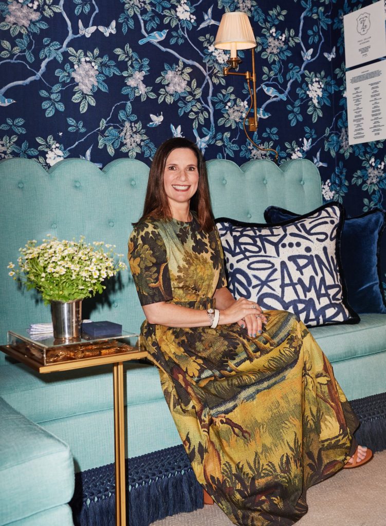 Traci Zeller, Traci Zeller Interiors, in her Gossip Powder Room (Photo by Jonathan Zizzo)