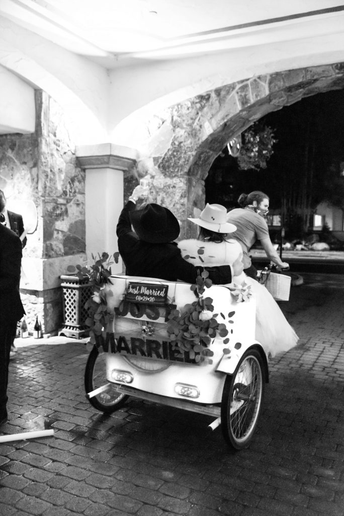 Cowboy hats and "Just Married" pedicabs to end the night. (Photo by Lady Ilg Photography)