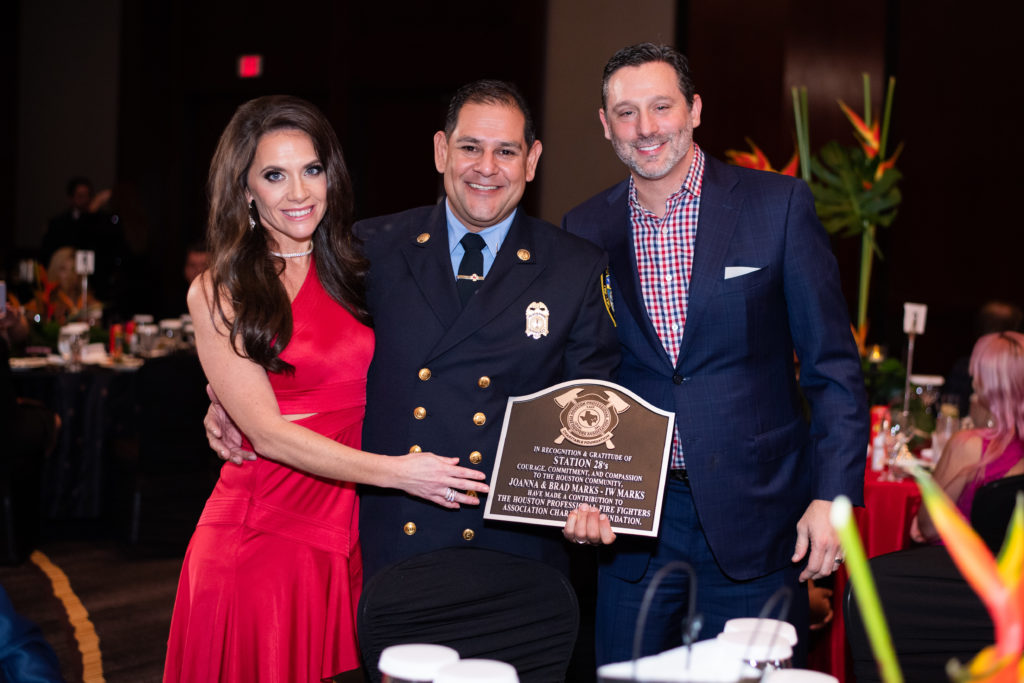 Joanna & Brad Marks receive special 
 honors at the Red Hot Gala benefitting the Houston Fire Fighters Association at the Royal Sonesta Hotel (Photo by Michelle Watson CatchlightGroup.com)