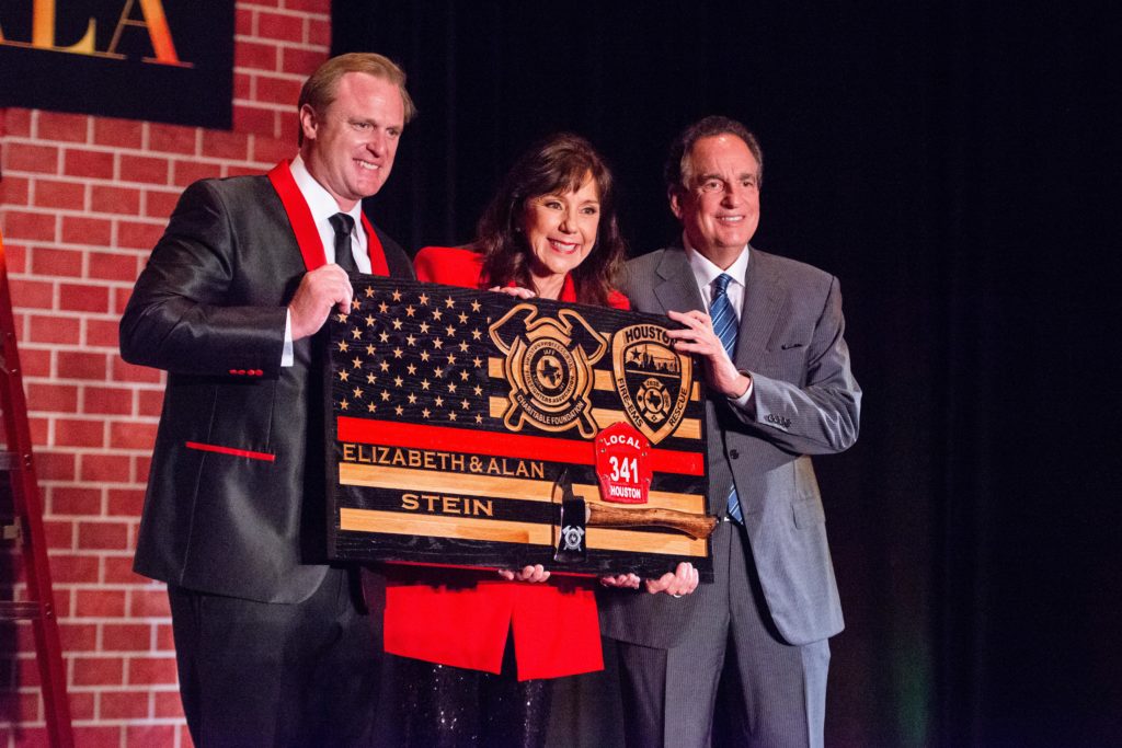 Patrick 'Marty' Lancton, chairs Elizabeth & Alan Stein at the Red Hot Gala benefitting the Houston Fire Fighters  Association at the Royal Sonesta Hotel (Photo by Michelle Watson CatchlightGroup.com)