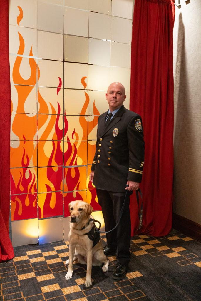 Arson Investigator Tim Kelly, and ATF dog Lux  (Photo by Daniel Ortiz)