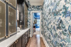 Farnham – Butler’s pantry with whimsical Schumacher wallpaper and brass finishes