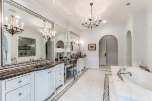Farnham master bath is Hollywood glamour with huge soaking tub and inlaid mosaic tile floors