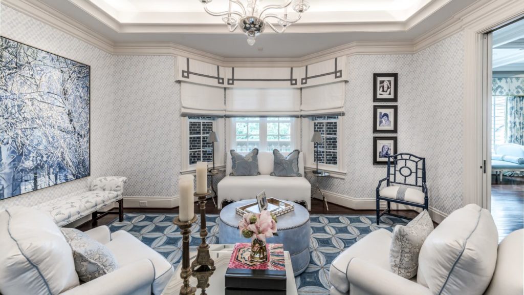 A sitting room off the master in shades of blue and white.