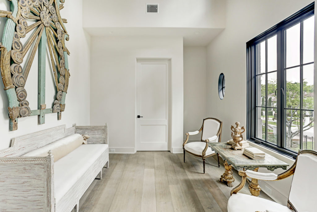 A sitting room on the second floor joins two of the second floor bedrooms