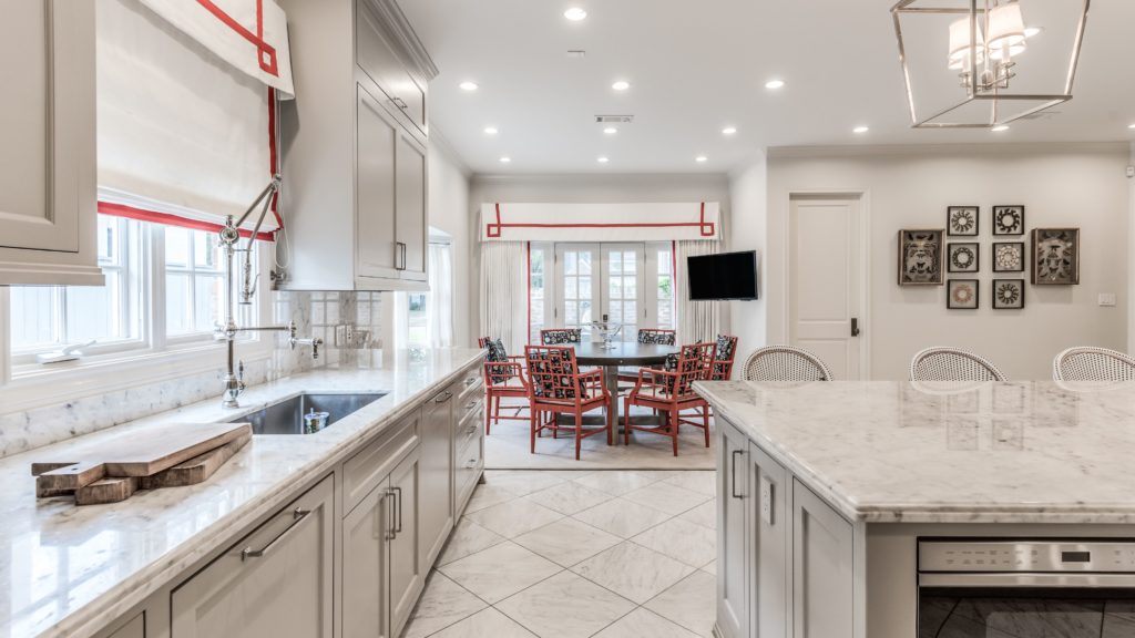 The kitchen with a view to breakfast room and patio beyond.