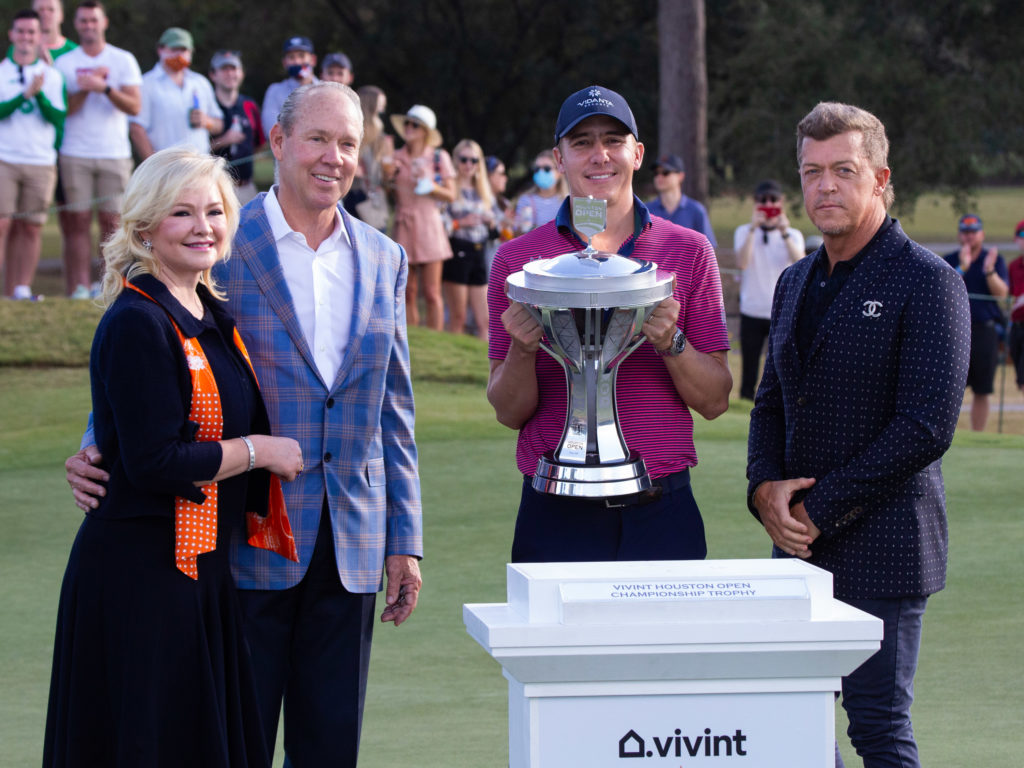 Whitney Crane, Jim Crane, Carlos Ortiz and Vivint CEO Todd Pederson pose after Ortiz's two shot victory. (Photo by F. Carter Smith)