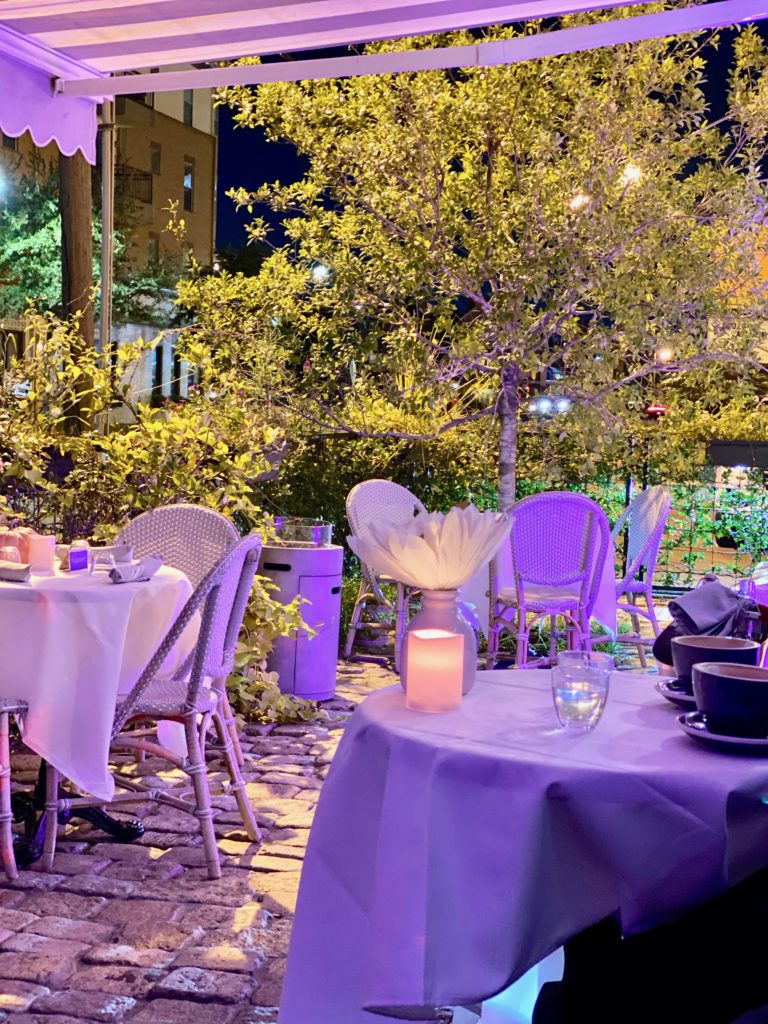 The romantic patio at Café Poêtes, the near-Midtown eatery on West Gray.