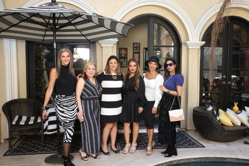 LeTricia Wilbanks, Tisha Cook, and friends at a Women of Substance watch party. (Courtesy photo)