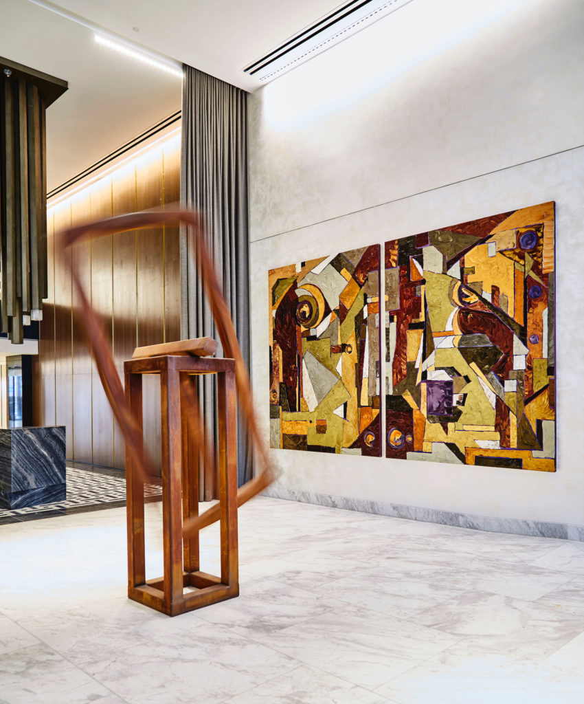 In the lobby, sculpture by Raul Mourão. Painting by JD Miller. (Photo by Gustav Schmiege)