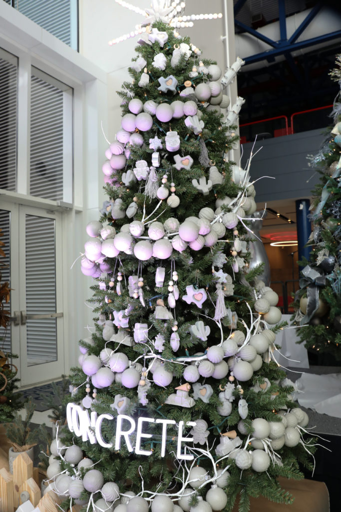 The Alley Theatre Deck the Trees display of decorated conifers. The Concrete Christmas by Natural.