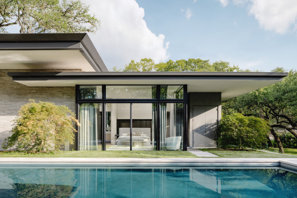 Light fills the master bedroom of the Austin residence designed by the Michael Hsu Office of Architecture.  (Photo by Chase Daniel)