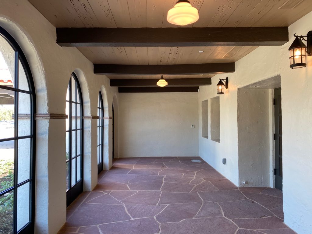 The loggia entrance to the former Historic Clubhouse at Hermann Park is now an enclosed parlor at the newly-named Lott Hall.  (Photo by Shelby Hodge)