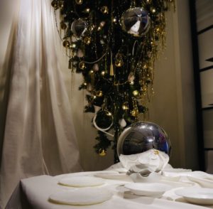 “The Dining Room” features a funky upside-down Christmas tree that makes a silly holiday photo (Photo by Marcus Pontello).