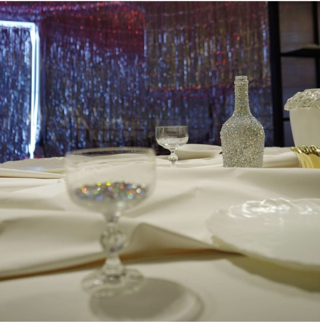 "The Dining Room" mimics the classic holiday family dinner without the dinner guests. (Photo by Marcus Pontello) 