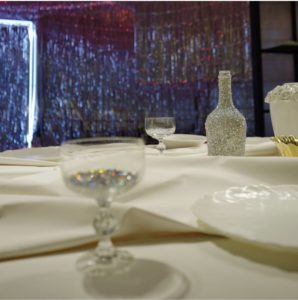 “The Dining Room” mimics the classic holiday family dinner without the dinner guests. (Photo by Marcus Pontello)