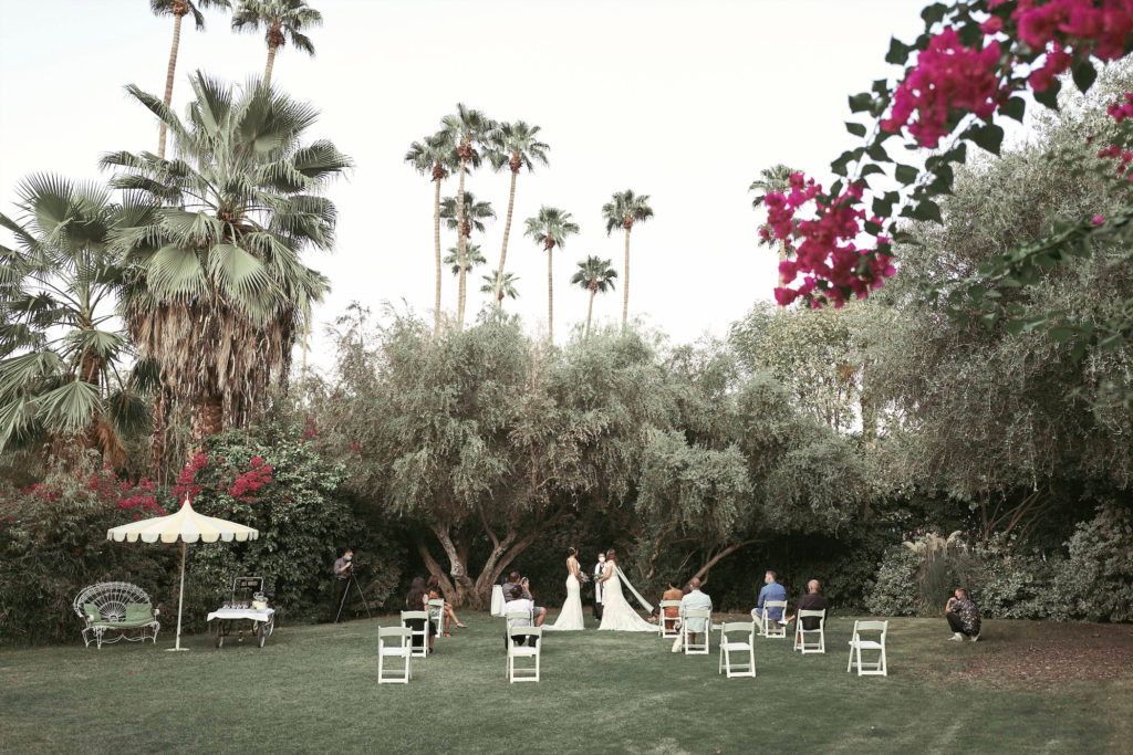 The couple was married at magic hour under a canopy of olive trees at the Parker Palm Springs. (Photo by Tom Shirmacher)