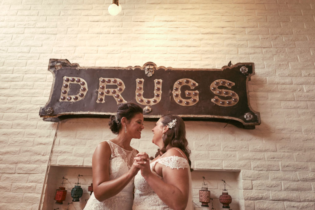 In front of the infamous "Drugs" sign at the Parker, known for its bold, cheeky style led by designer Jonathan Adler. (Photo by Tom Shirmacher)