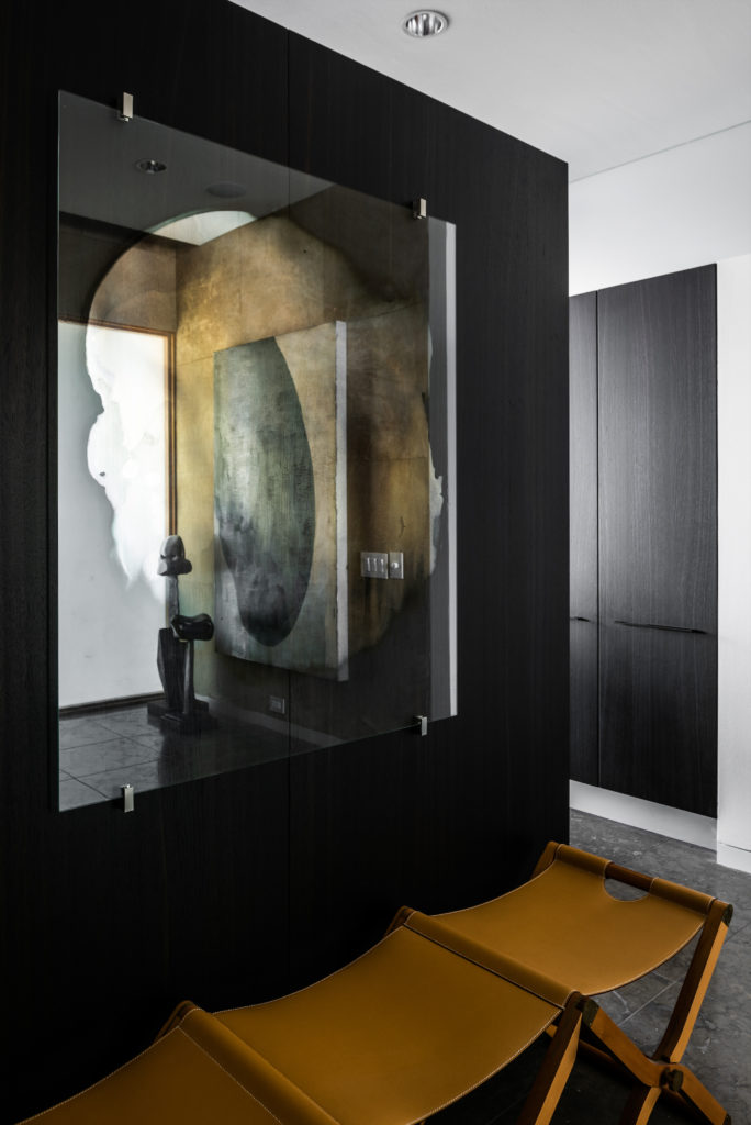 In the entry, an Hermès bench. Above, Swedish artist Jenny Nordberg's "3 to 5 seconds." (Photo by Robert Yu)