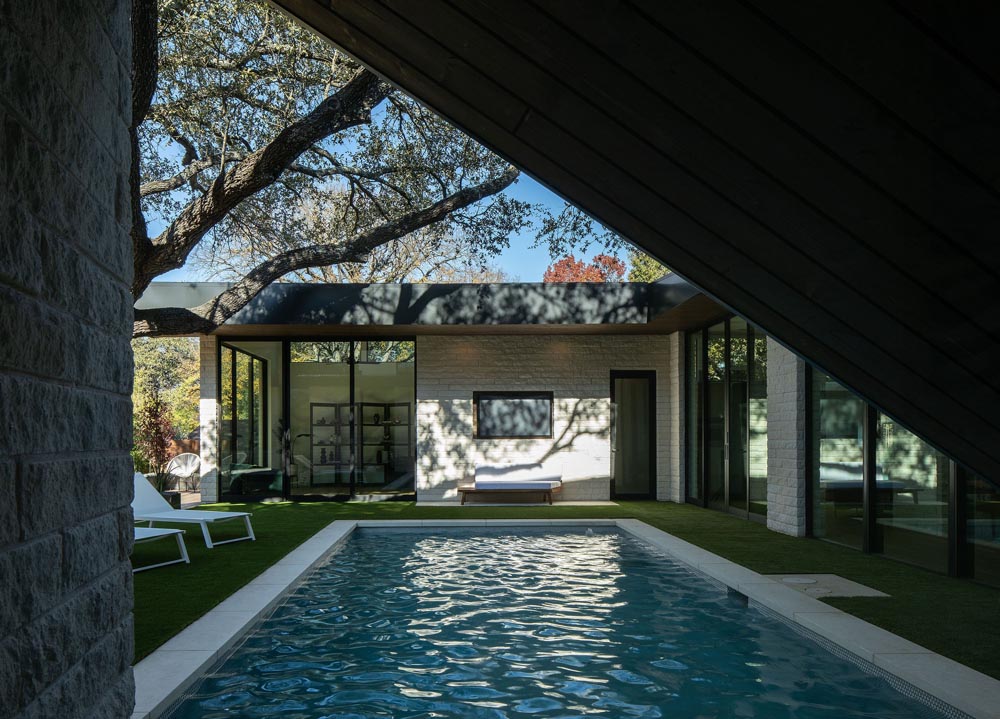 Coxist Studio designed this custom residence, constructed by FIA Homes, which is built in a U shape around a heritage oak with a pool in the middle. (Photo by Jake Holt)