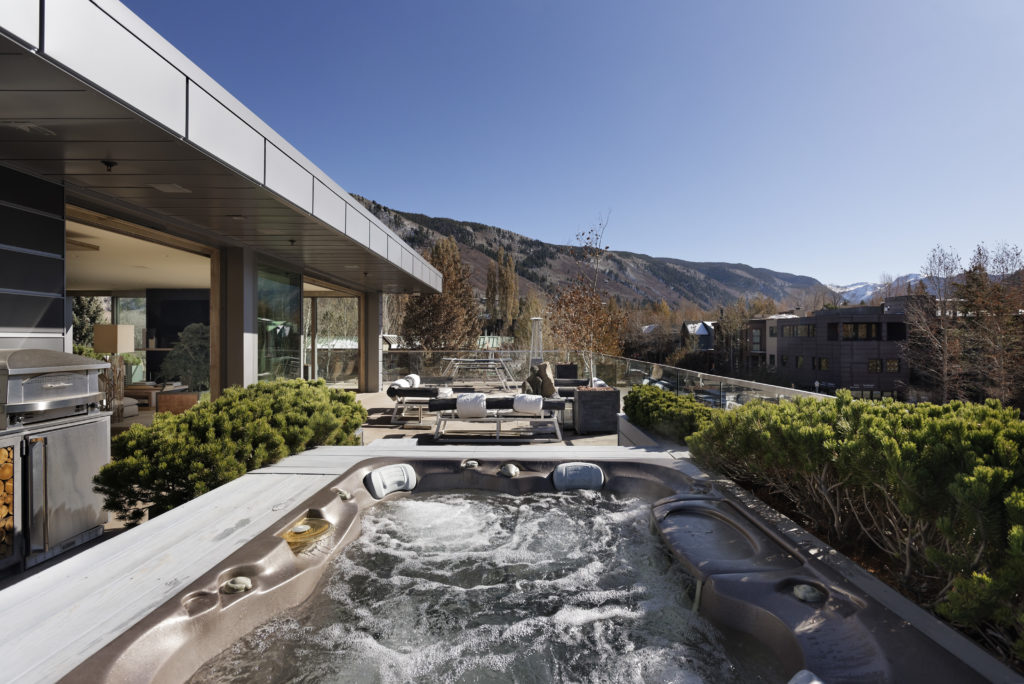 The Crandall Building penthouse, noted as the most expensive apartment sale of 2020 in Aspen, features a rooftop pool amid the 2,000 sq.ft. outdoor living space. (Douglas Elliman photo)