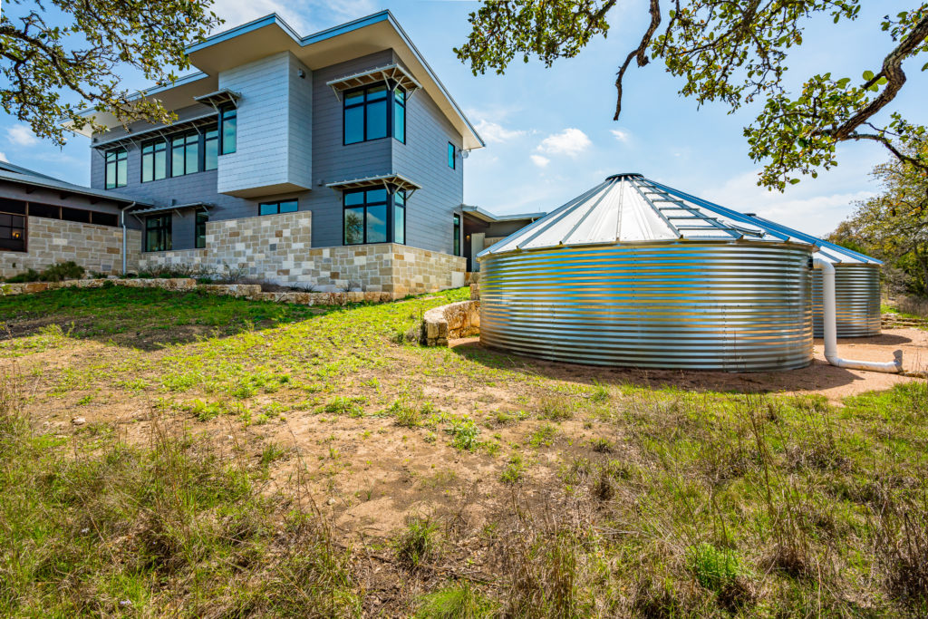 Barley/Pfeiffer Architecture designed this Texas Hill Country retreat with a 50,000 gallon rainwater collection system. (Photo by Mark Adams Media)