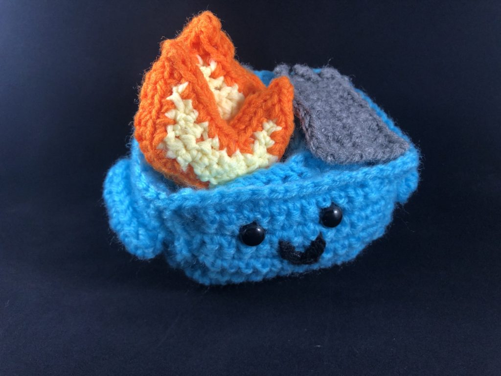 A dumpster fire of a year summed up in crochethed goodness: Elizabeth Moeller's "McDumpsty," 2020.