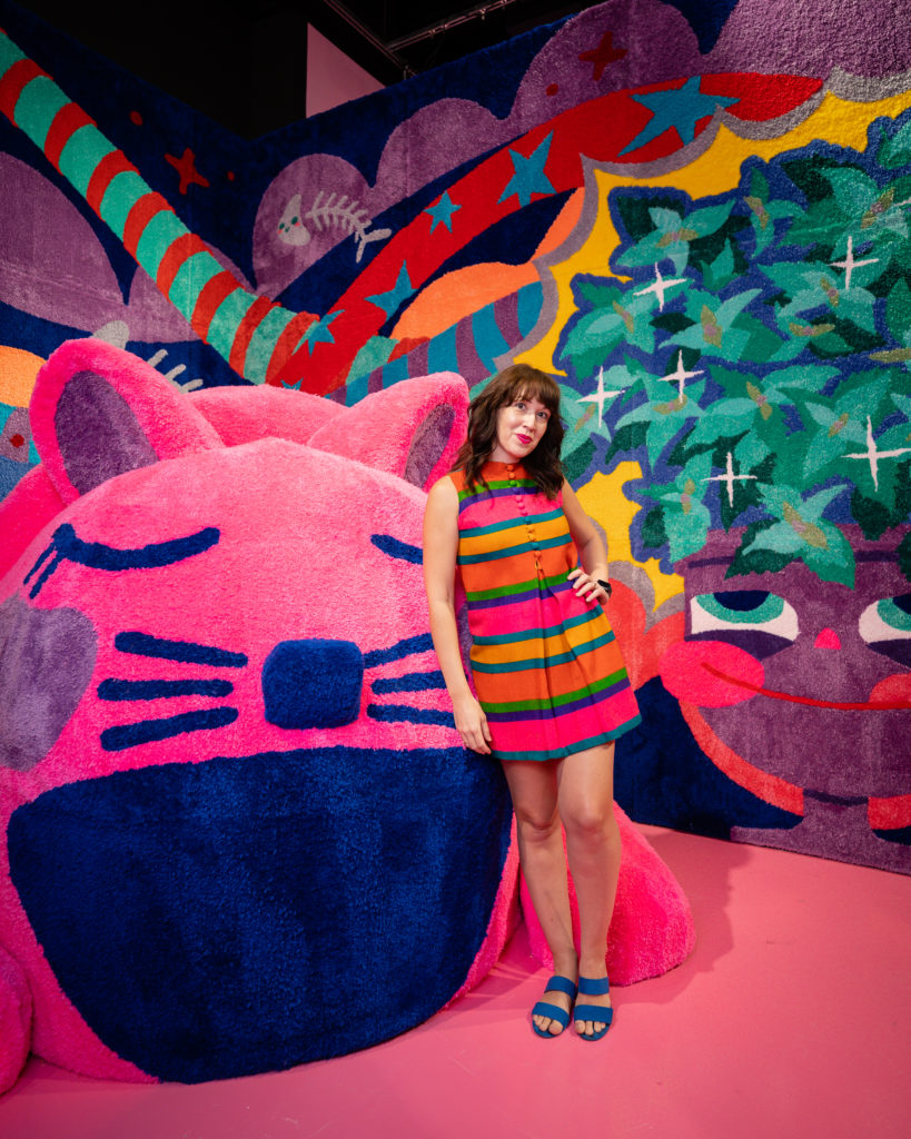 Jencey Keeton, founder of Sweet Tooth Hotel, plays cat and mouse in Hannah Busekrus' installation. (Photo by Timothy Alsbrooks)