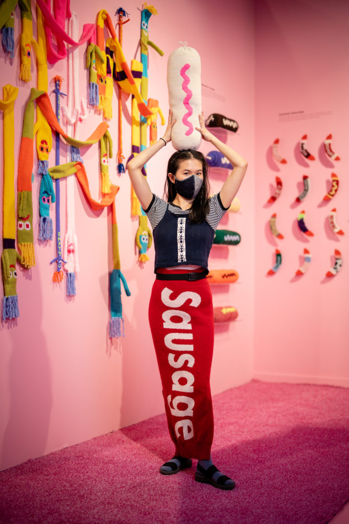 Joanna Lin from Soft Surprise strikes a pose in front of her installation, "You (are) Tube." (Photo by Timothy Alsbrooks)