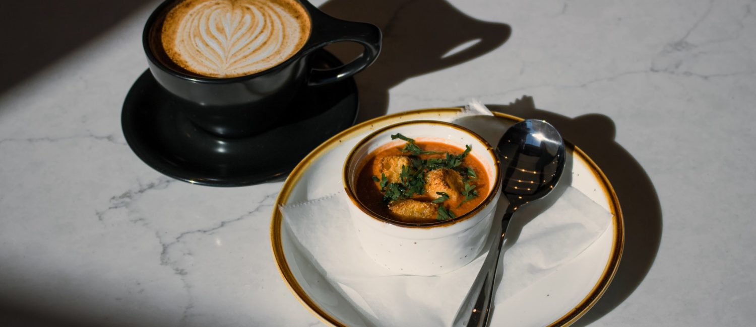 White Rhino winter spiced latte and a cup of tomato basil soup.