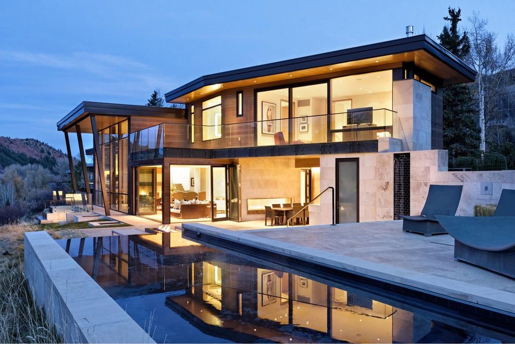 Walls of glass and a second floor terrace at 720 Willoughby Way in Aspen helped the owner get a sales price of $27 million. (Douglas Elliman photo)