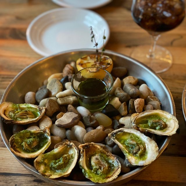 Tempest is dedicated to local seafood fare including charcoal grilled oysters and seafood towers. 